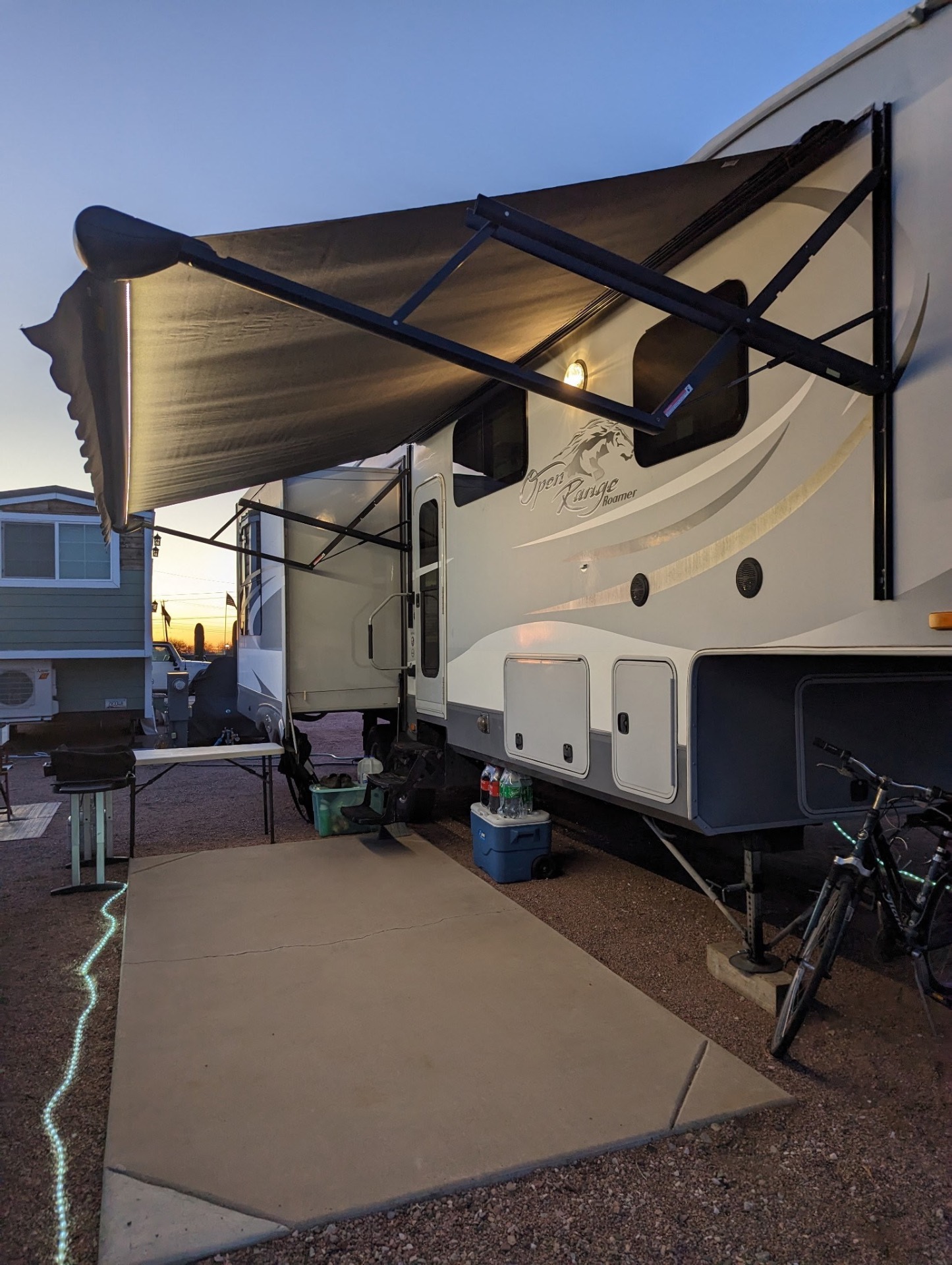 Newly installed RV awning providing shade at the campsite